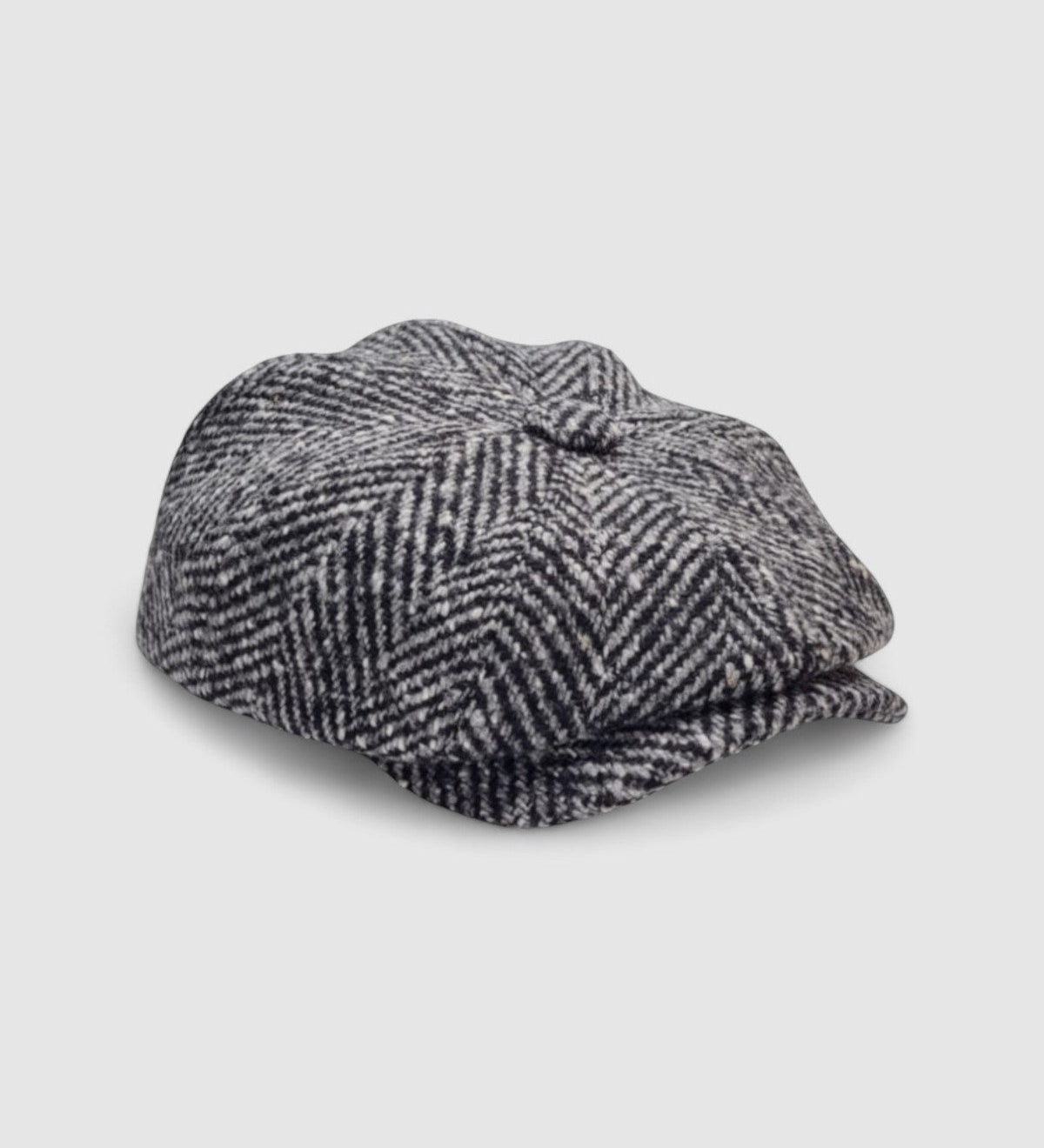 Bakerboy cap in charcoal virgin wool — Albert’s Pepper, structured and sleek, handmade by Mister Miller. side view,