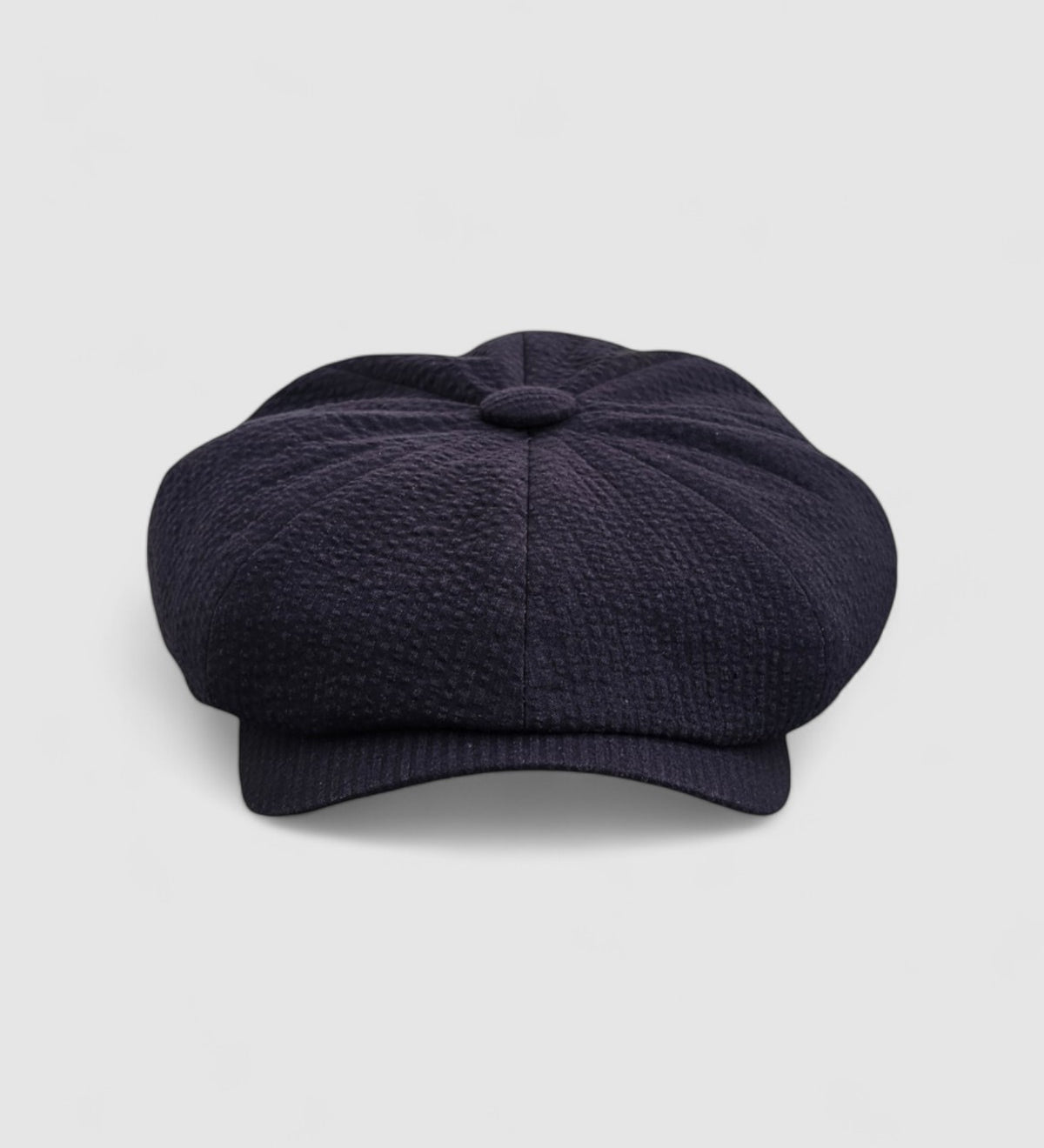 Bakerboy cap in navy seersucker cotton — Albert’s Azur, elegant and breathable, handmade by Mister Miller. front view