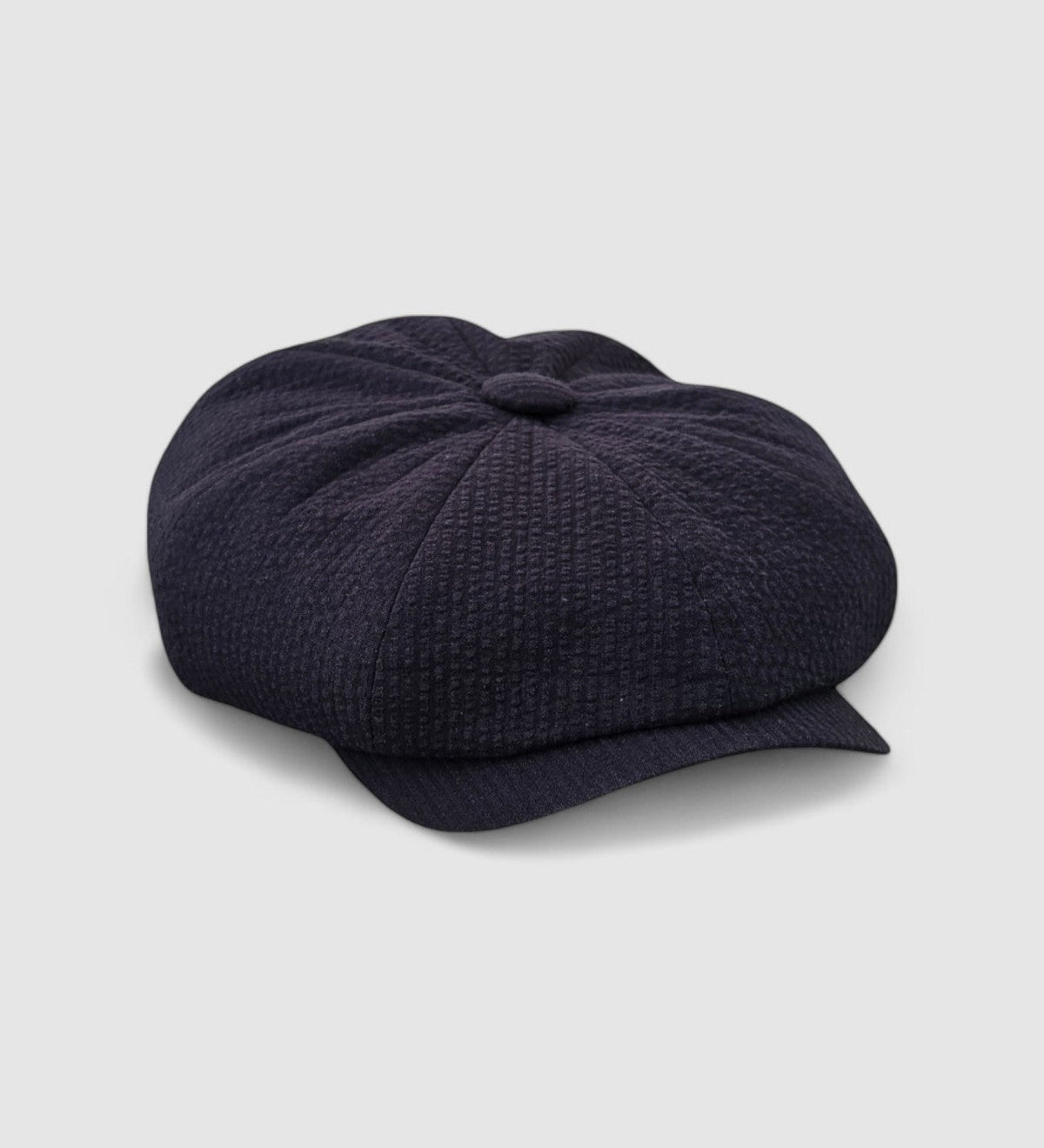Bakerboy cap in navy seersucker cotton — Albert’s Azur, elegant and breathable, handmade by Mister Miller. side view