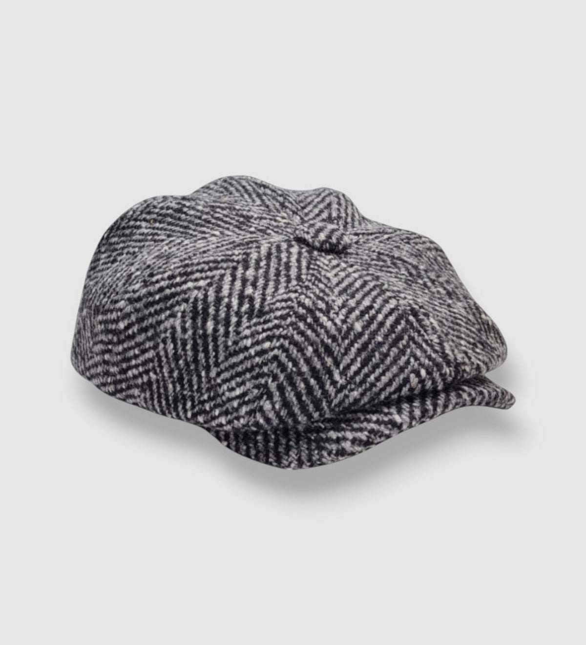 Bakerboy cap in grey herringbone virgin wool — Albert’s Salt, classic texture with structure, handmade by Mister Miller. side view.