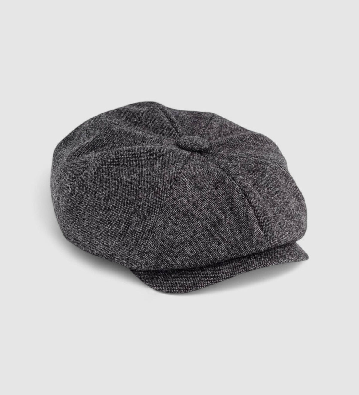 Bakerboy cap in grey merino lambswool — Albert’s Smoke, fine Donegal texture, handmade by Mister Miller. side view.