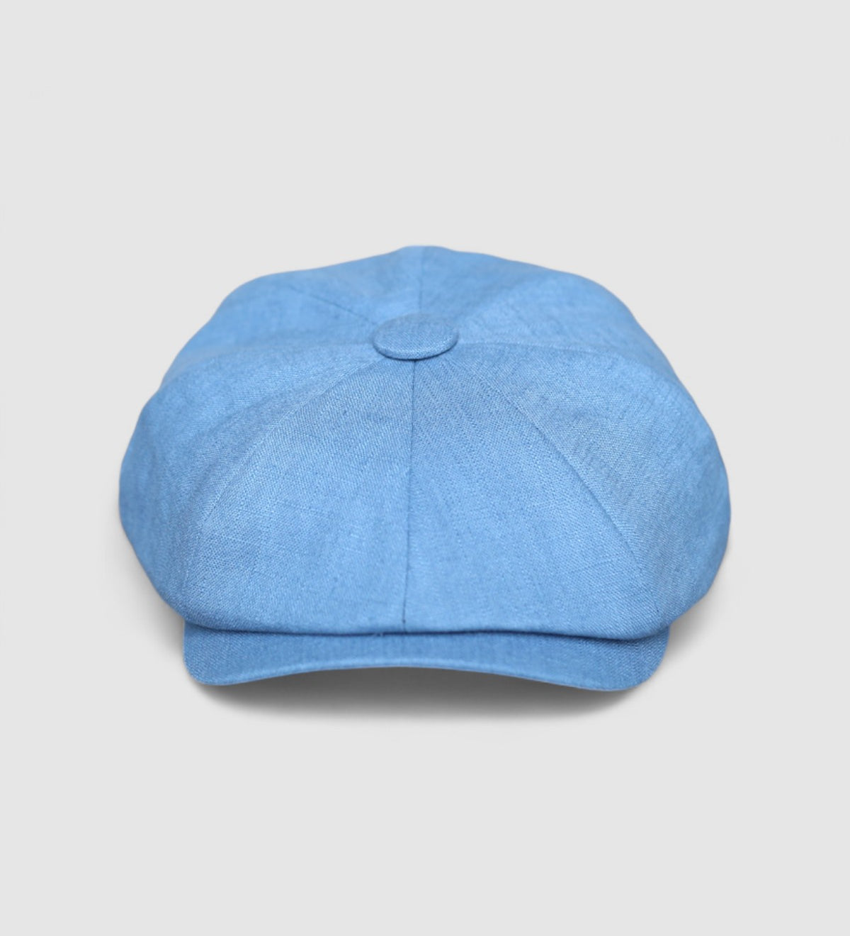 Bakerboy cap in ink-blue washed linen — Albert’s Wave, modern folded headband detail, handmade by Mister Miller. front view.