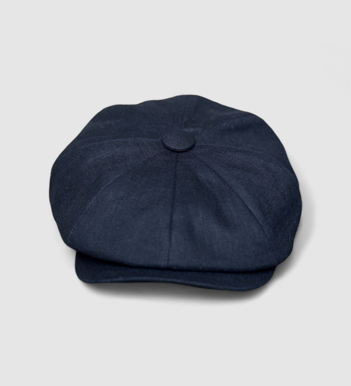 Bakerboy cap in black washed linen — Albert’s Nights, versatile spring/summer style, handmade by Mister Miller. front view.