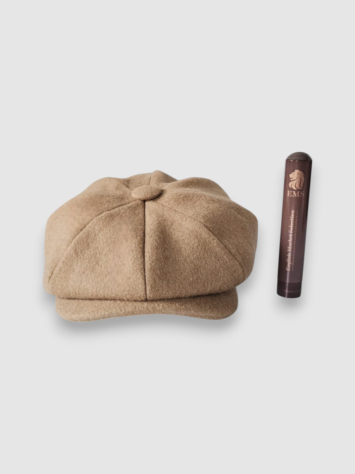 Beige camel hair Cigar Bakerboy cap — Albert’s Holy Smoke by Mister Miller, head on with cigar case beside