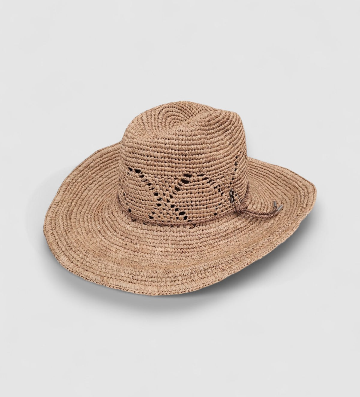 Raffia straw cowboy hat with wide brim, lattice weave, and brown wax cord, by Mister Miller.