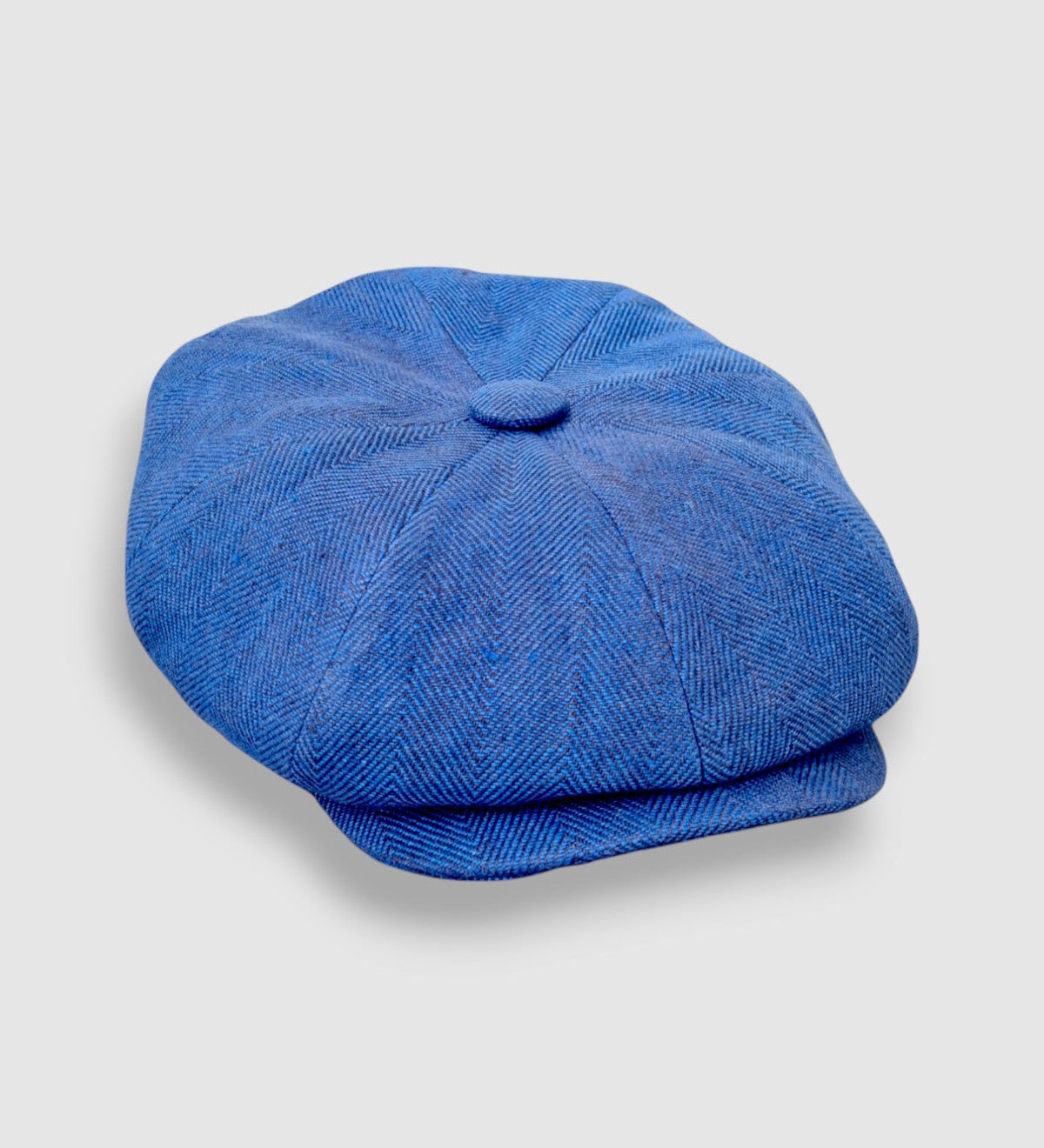 Bakerboy cap in soft blue washed Irish linen with herringbone texture — Riley’s Twilight by Mister Miller. side view