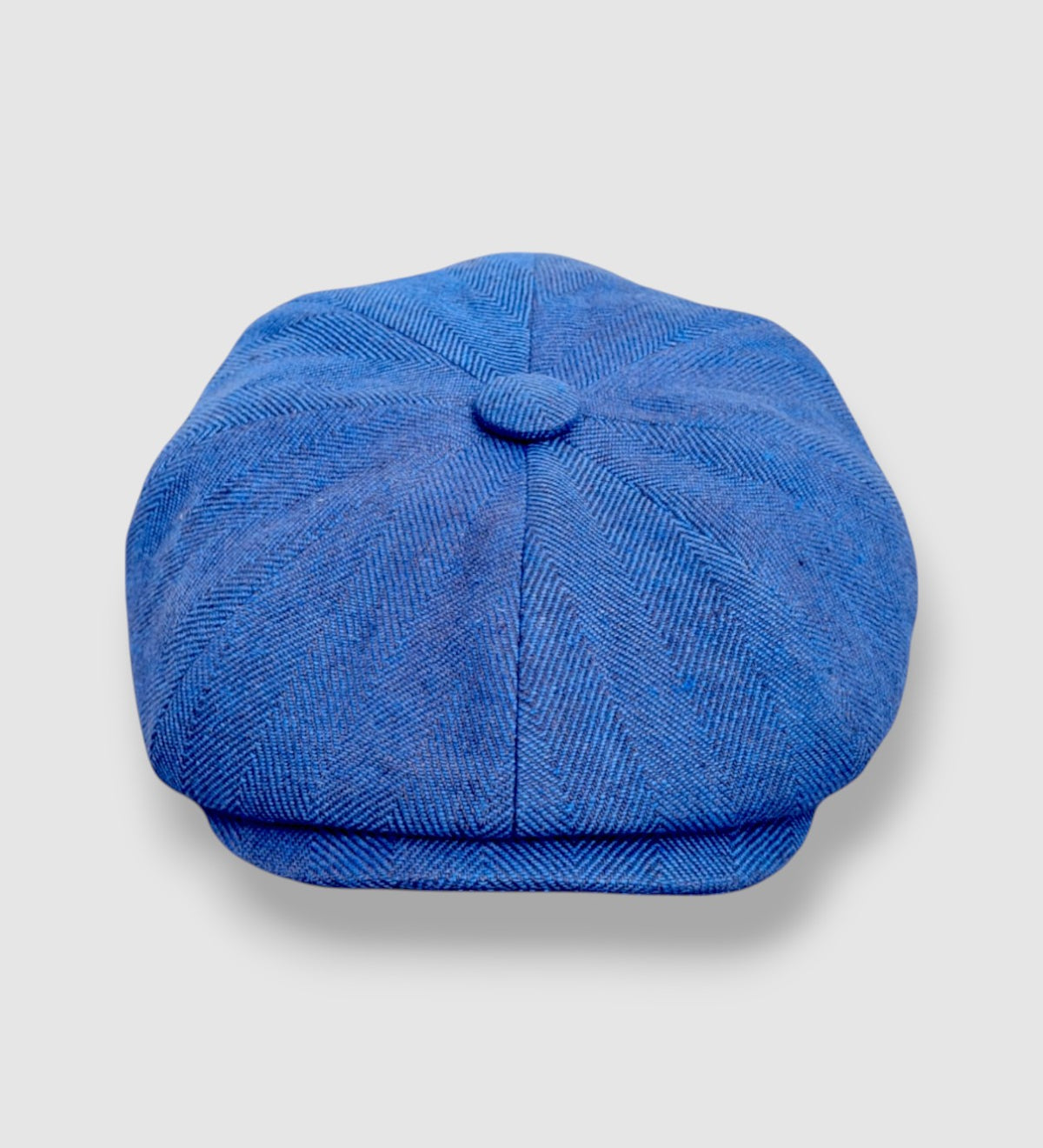 Bakerboy cap in soft blue washed Irish linen with herringbone texture — Riley’s Twilight by Mister Miller. front view