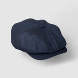 Bakerboy cap in black washed linen — Albert’s Nights, versatile spring/summer style, handmade by Mister Miller. side view.