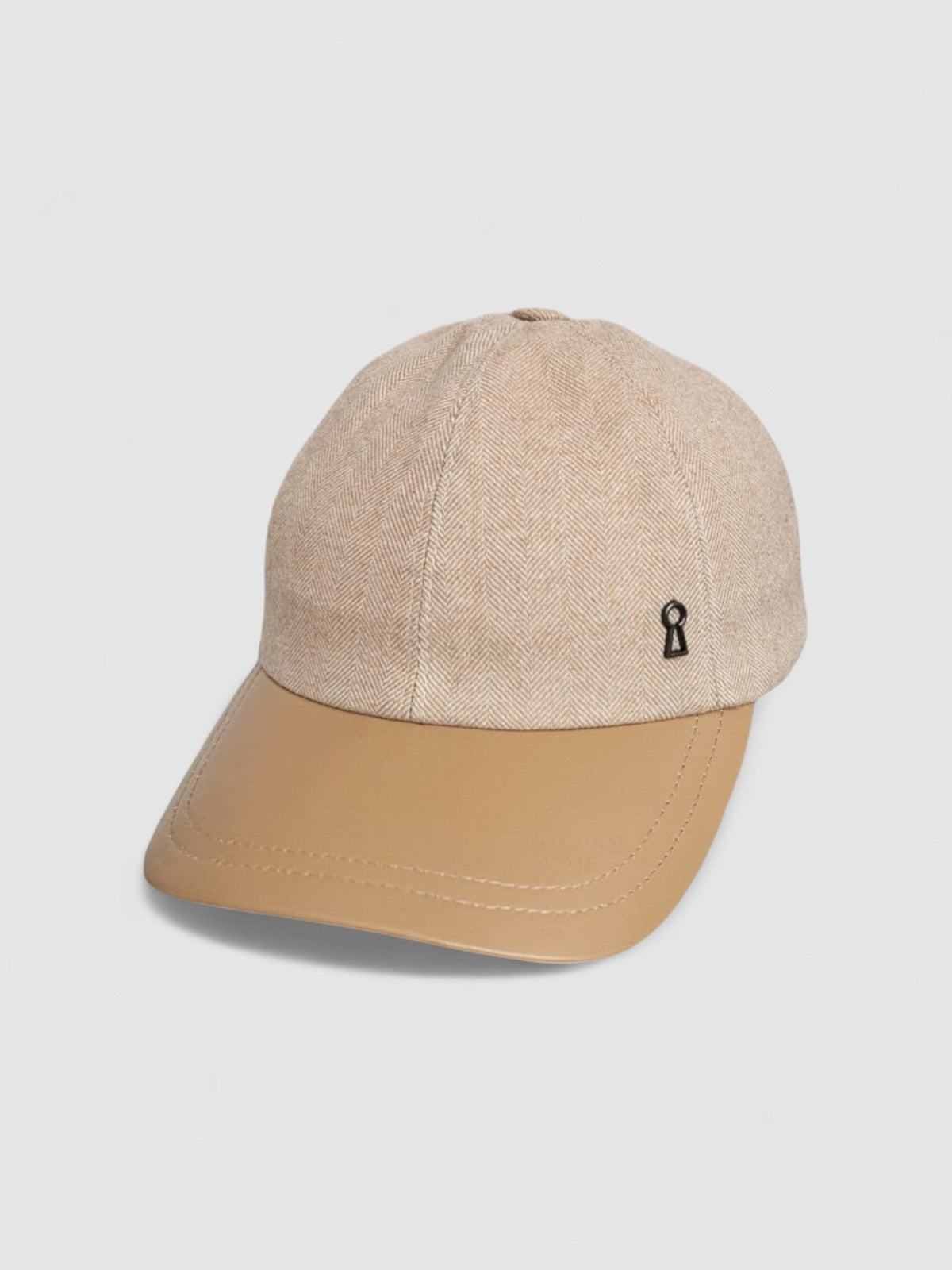 Camel cashmere herringbone baseball cap with tan leather peak, by Mister Miller. angle view