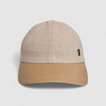 Camel cashmere herringbone baseball cap with tan leather peak, by Mister Miller.