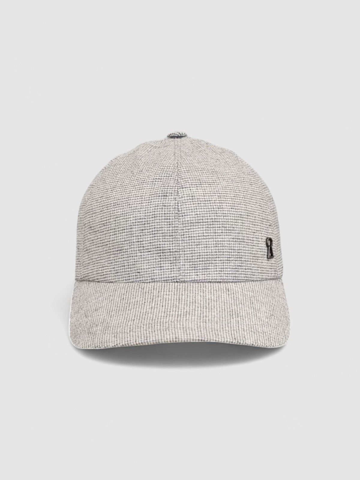 Grey textured baseball cap with adjustable fit, handmade by Mister Miller.