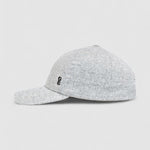 Grey textured baseball cap with adjustable fit, handmade by Mister Miller. profile view