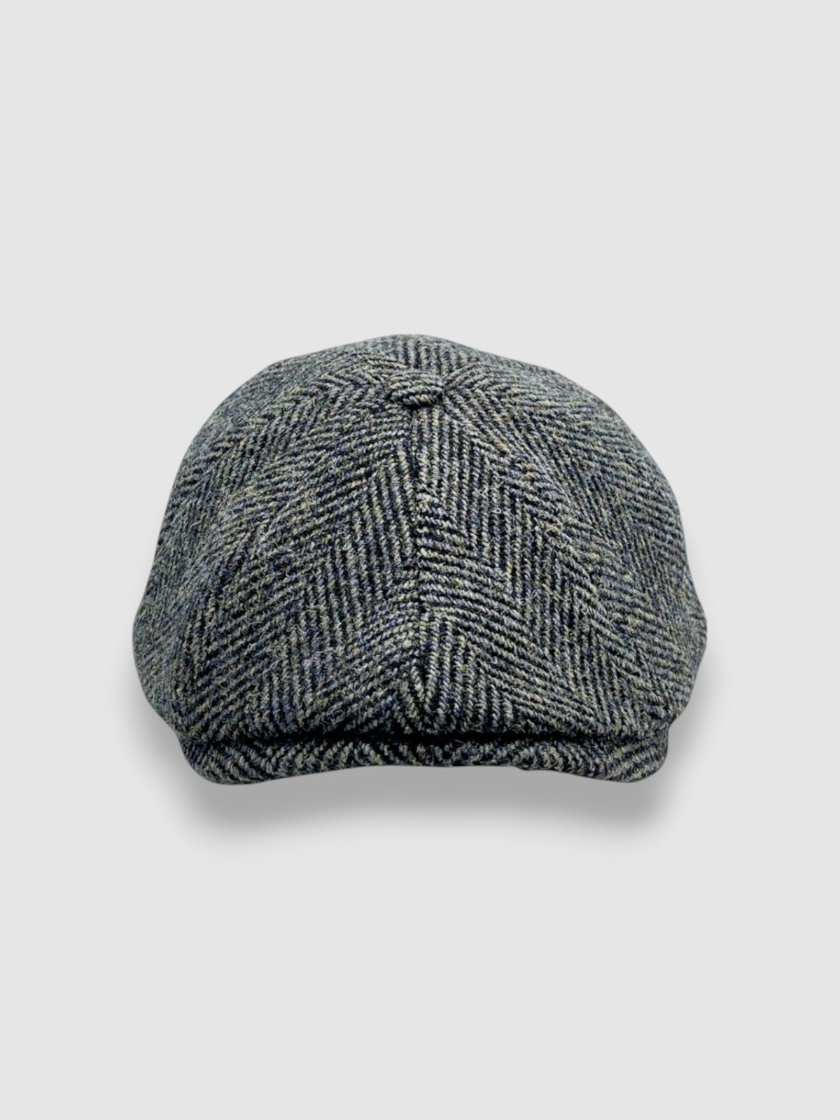 Newsboy cap in black and brown Harris tweed herringbone – Jack’s Gypsy by Mister Miller. front view