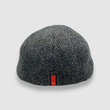 Newsboy cap in black and brown Harris tweed herringbone – Jack’s Gypsy by Mister Miller. rear view