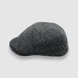 Newsboy cap in black and brown Harris tweed herringbone – Jack’s Gypsy by Mister Miller. profile view