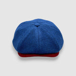 Newsboy cap in teal Melton wool with red and grey contrast peak – Jack’s Steal by Mister Miller. front view