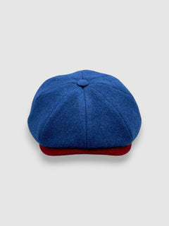 Newsboy cap in teal Melton wool with red and grey contrast peak – Jack’s Steal by Mister Miller. front view