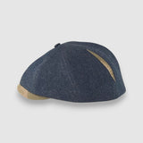 Newsboy cap in denim with camouflage peak – Jack’s Jeans slim-cut 8-panel flat cap handmade in Britain by Mister Miller. Profile view