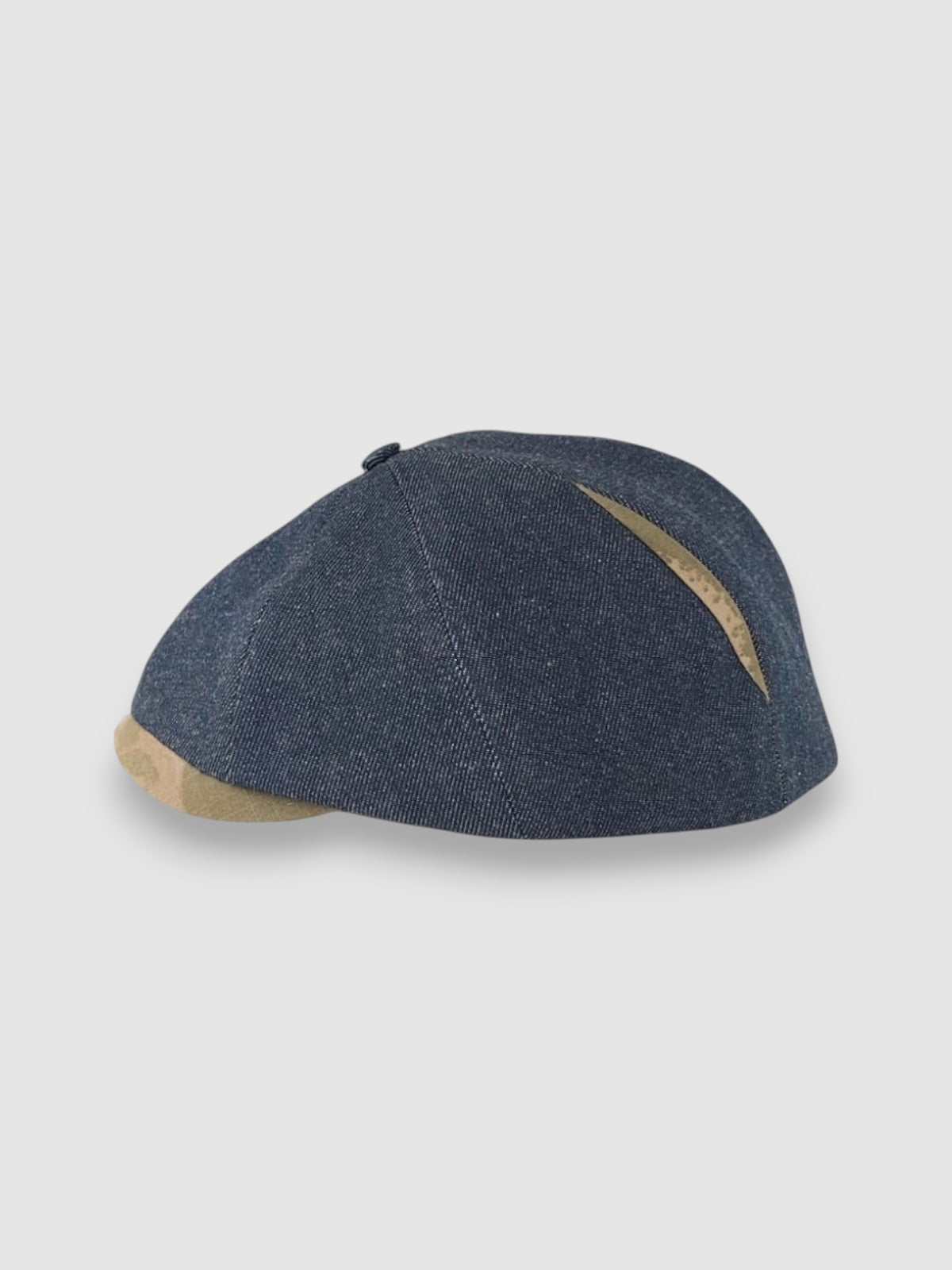 Newsboy cap in denim with camouflage peak – Jack’s Jeans slim-cut 8-panel flat cap handmade in Britain by Mister Miller. Profile view