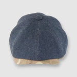 Newsboy cap in denim with camouflage peak – Jack’s Jeans slim-cut 8-panel flat cap handmade in Britain by Mister Miller. front view