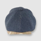 Newsboy cap in denim with camouflage peak – Jack’s Jeans slim-cut 8-panel flat cap handmade in Britain by Mister Miller. front view