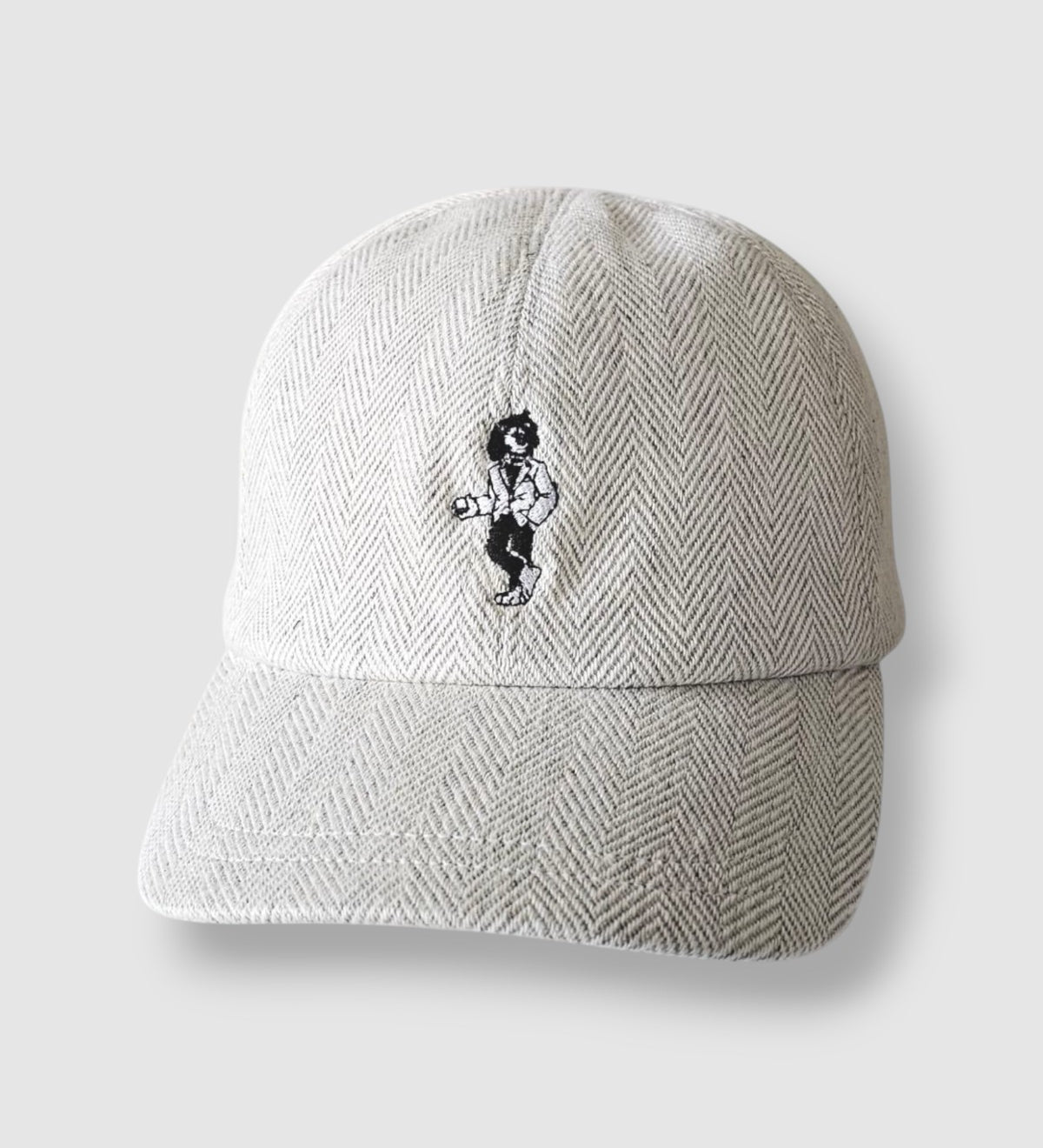 Beige wool baseball cap with lion embroidery. A limited-edition Mister Miller x Gentleman’s Racer collaboration.