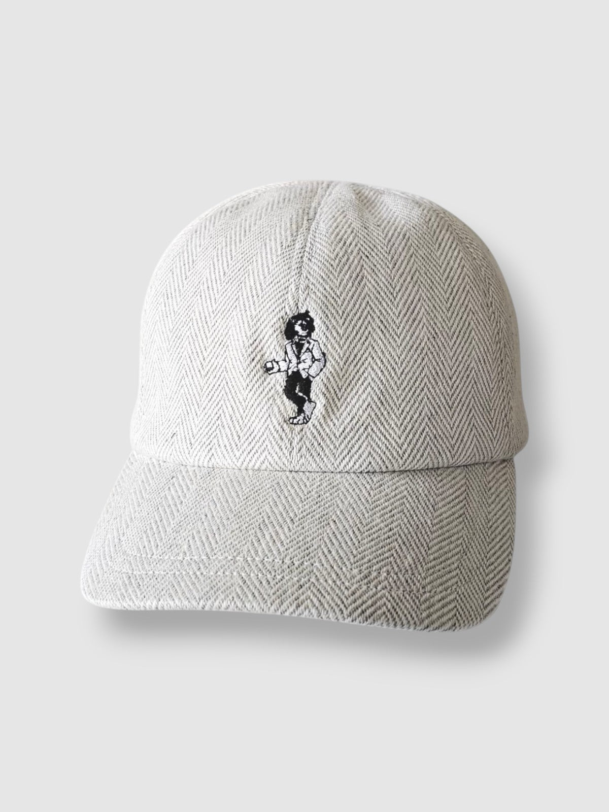 Beige wool baseball cap with lion embroidery. A limited-edition Mister Miller x Gentleman’s Racer collaboration.