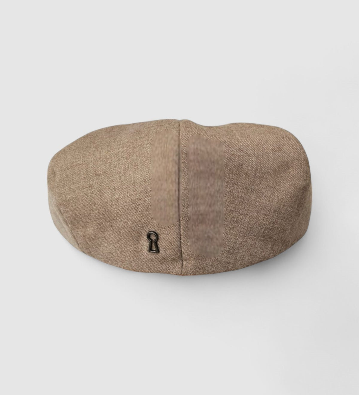 Bakerboy cap in beige cashmere wool with tan calfskin leather peak — Riley Says by Mister Miller, handmade in Britain for timeless style and quiet luxury. rear view