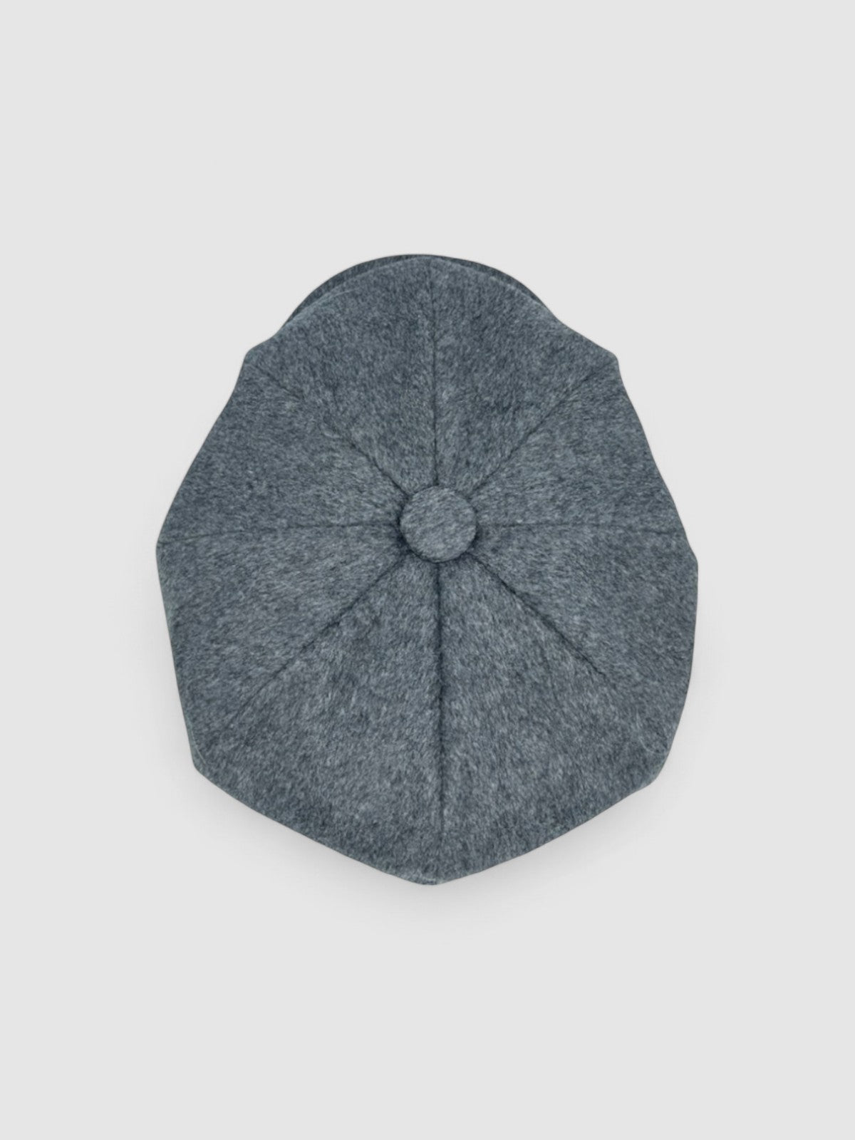 Bakerboy cap in soft grey 100% cashmere wool — Riley’s Companion by Mister Miller, handmade in Britain. top view