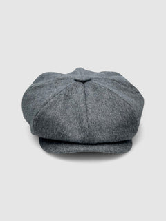 Bakerboy cap in soft grey 100% cashmere wool — Riley’s Companion by Mister Miller, handmade in Britain. front view
