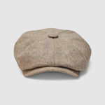 Bakerboy cap in beige herringbone Merino lambswool — Riley’s Peregrine by Mister Miller, handmade in Britain. front view