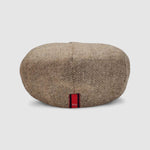 Bakerboy cap in beige herringbone Merino lambswool — Riley’s Peregrine by Mister Miller, handmade in Britain. rear view