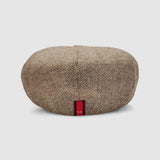 Bakerboy cap in beige herringbone Merino lambswool — Riley’s Peregrine by Mister Miller, handmade in Britain. rear view