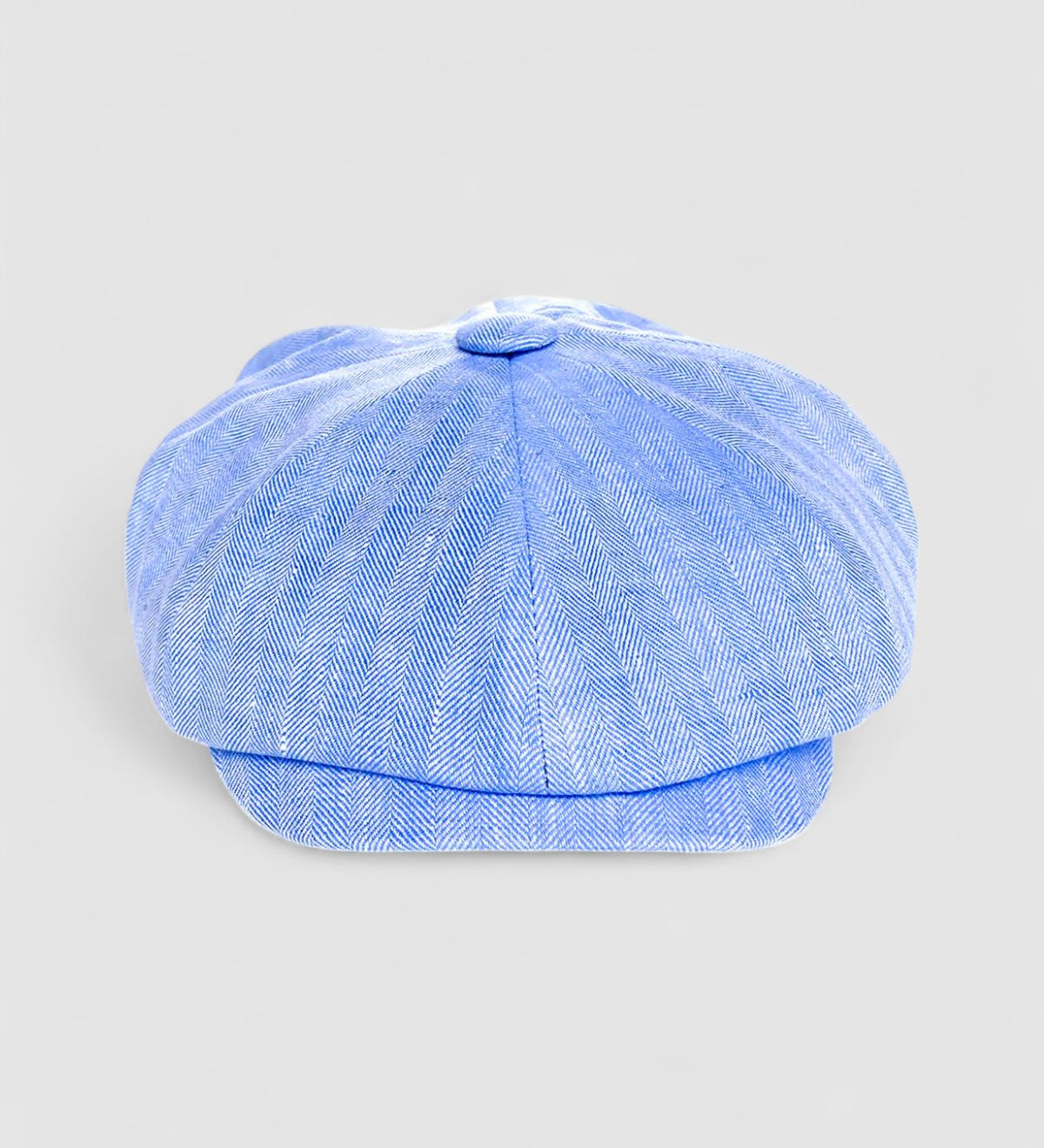 Bakerboy cap in light blue Irish linen herringbone — Riley Skies by Mister Miller, a breathable summer hat handmade in Britain. front view