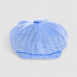 Bakerboy cap in light blue Irish linen herringbone — Riley Skies by Mister Miller, a breathable summer hat handmade in Britain. front view