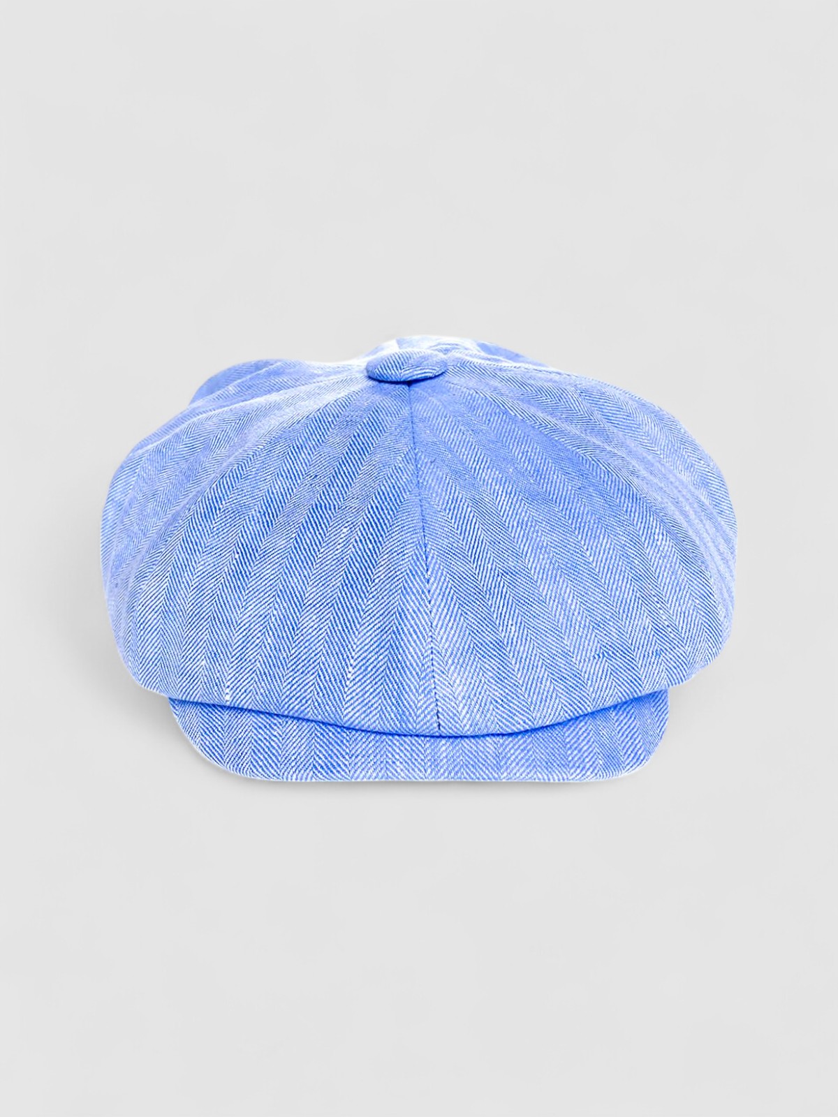 Bakerboy cap in light blue Irish linen herringbone — Riley Skies by Mister Miller, a breathable summer hat handmade in Britain. front view
