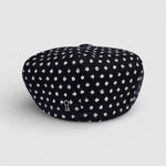 Navy Bakerboy cap with white polka dots rear view