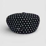 Navy Bakerboy cap with white polka dots rear view