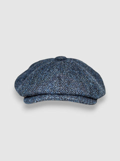Bakerboy cap in navy and black Harris tweed — Riley’s Trail by Mister Miller, handmade in Britain. front view