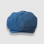 Blue newsboy cap in blue seersucker