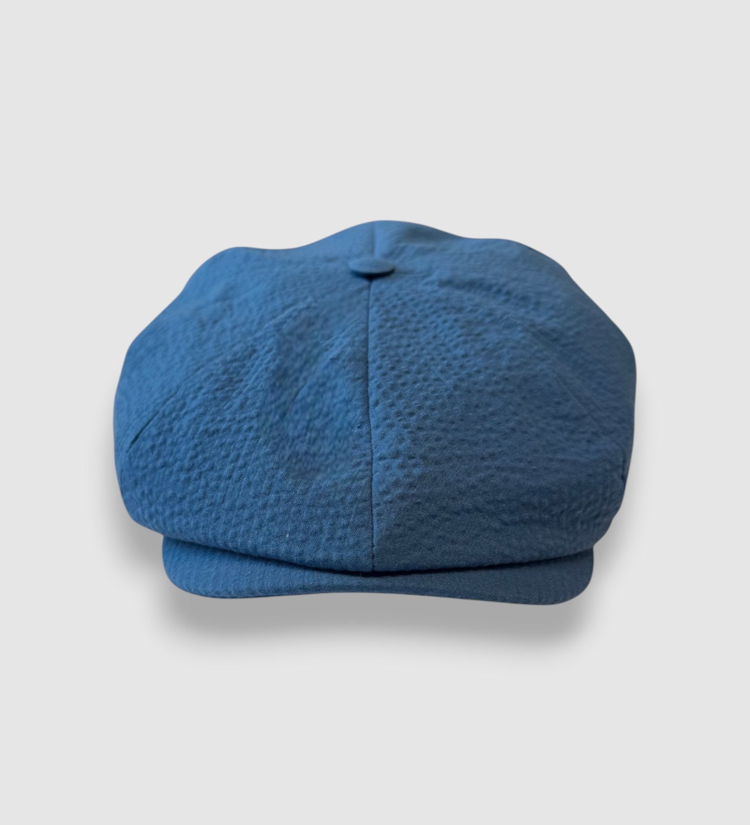 Blue newsboy cap in blue seersucker