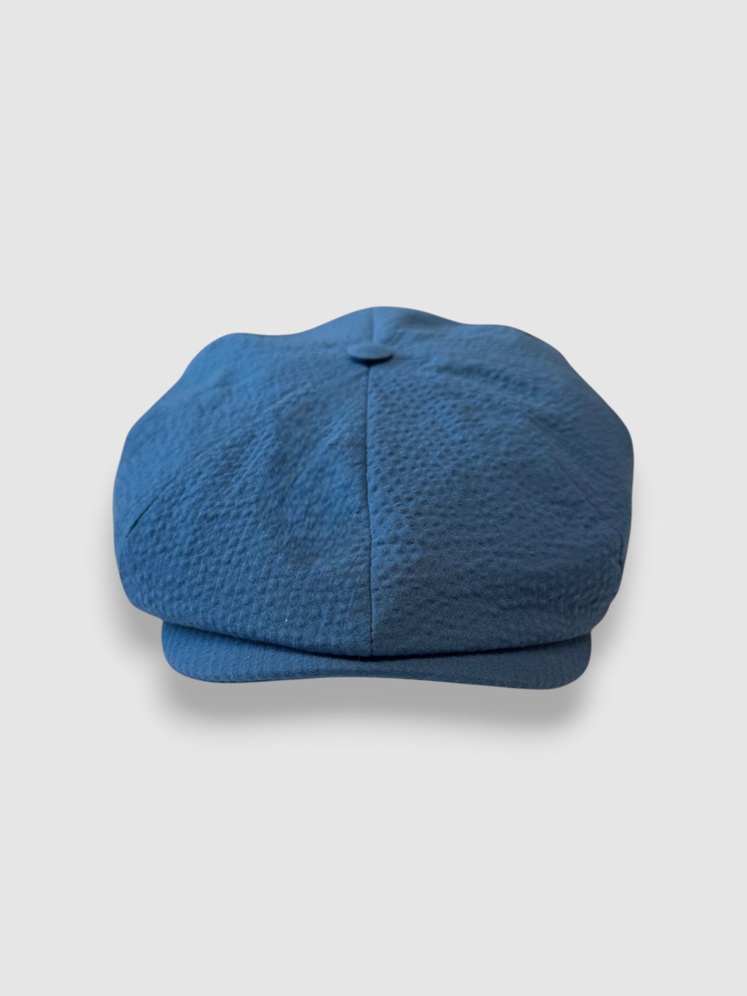 Blue newsboy cap in blue seersucker