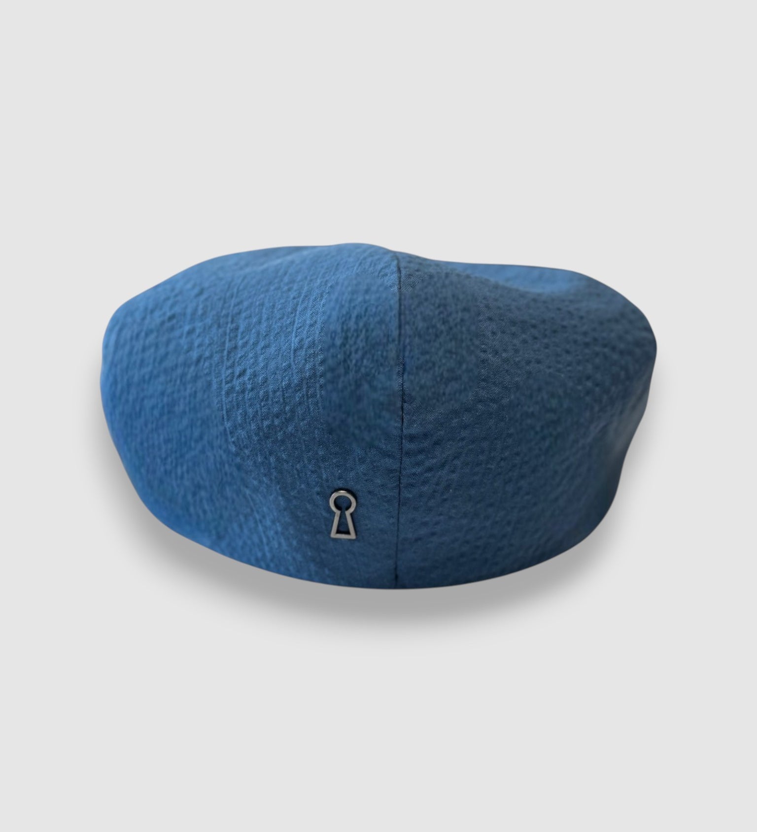 Blue newsboy cap in blue seersucker back view
