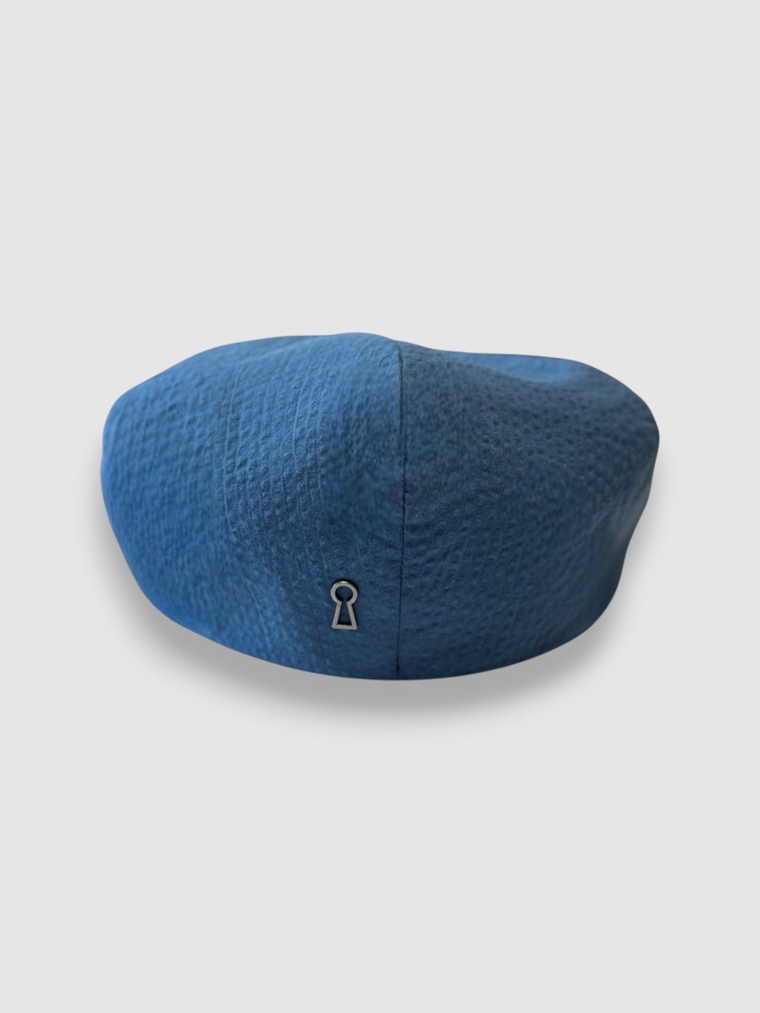 Blue newsboy cap in blue seersucker back view